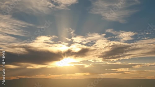 Golden Hour Sky - A Serene Sunset Cloudscape.