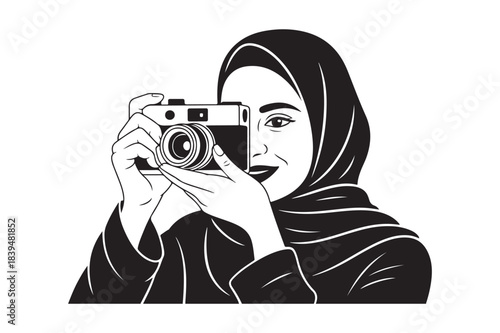 Woman in hijab holding a vintage camera capturing a moment