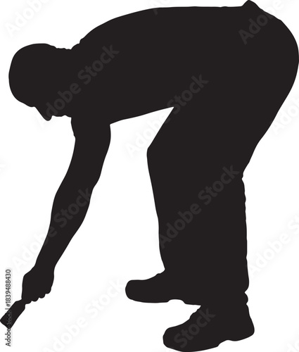 vector,silhouette of  Side view of a bent man holding a paintbrush painting something imaginary on the ground