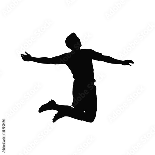 A silhouetted figure of a person jumping with arms outstretched in the air