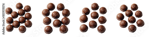 Set of milk chocolate cubes with soft caramel cores and broken triangular chocolate chips on transparent background