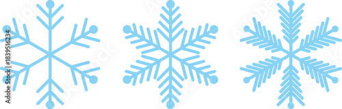 Three delicate blue and white snowflake illustrations on a clean white background