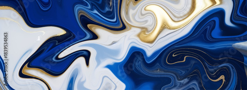Abstract fluid art with swirling blue white and gold colors