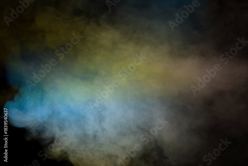 Blue and yellow steam on a black background.