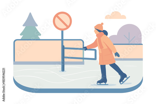 Winter skating scene with child in warm clothing at ice rink