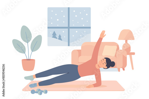 Woman exercising at home in cozy winter setting with yoga pose and fitness equipment