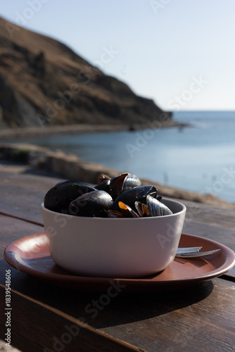 Seafood Dinner Outdoors, Sunset View With Tasty Shellfish, Romantic Seaside Meal Under Sunset Glow