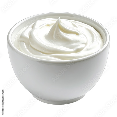 A close-up of creamy white yogurt or sour cream in a white bowl against a black background.