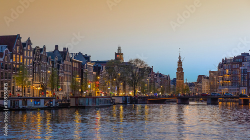 Night view reflected on canal Amsterdam