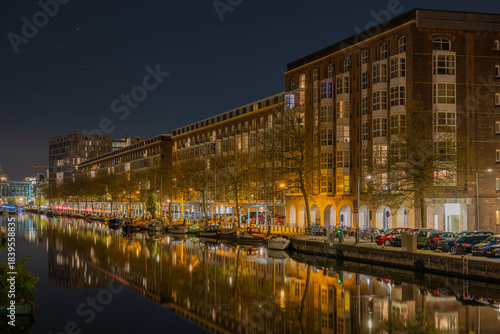 Golden reflection view on Amsterdam canal