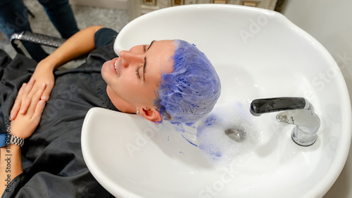 Hair bleaching process at modern barbershop