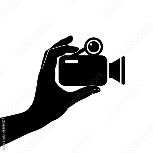 Black Silhouette of a Hand Holding a Video Camera Icon, Symbolizing Filmmaking, Content Creation, or Recording, Isolated on Transparent Background for Versatile Design Use