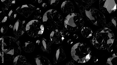 Luxurious abstract background featuring scattered black diamonds with shiny facets on a dark surface, representing wealth and elegance in a monochrome style.