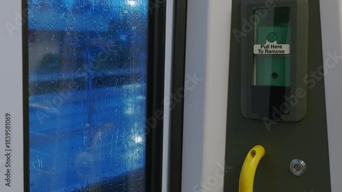 Green alarm emergency button on train in england uk