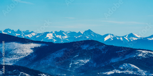 Fototapeta Naklejka Na Ścianę i Meble -  High Tatras mountains from Barania Gora hill in winter Beskid Slaski mountains in Poland