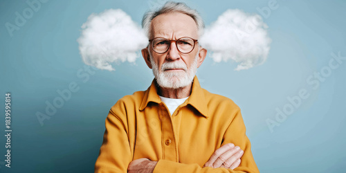 Angry senior man with a beard and glasses, arms crossed, showing a cartoon visual of steam from ears
