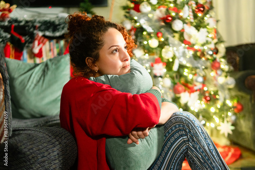 Woman feeling loneliness during christmas holidays at night