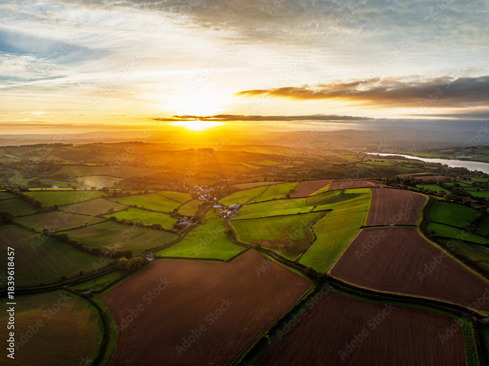 Fototapeta premium Colours of autumn Fields and Farms over Sheldon from a drone, Torbay, Devon, England