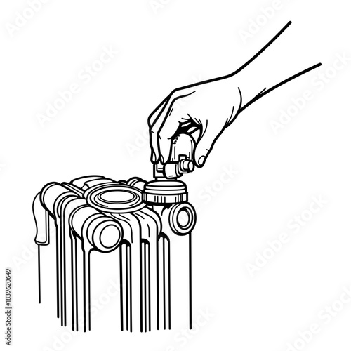 Hand adjusting radiator valve, home heating control and energy efficiency concept