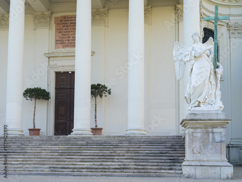 Photography Entrance of Karlskirche Vienna with ornate columns in bright summer sunlight