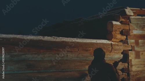 Working with a sledgehammer, knocking down a log with a sledgehammer, hitting with a sledgehammer