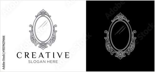 Ornate oval mirror logo design with decorative frame presented on both white and black backgrounds.
