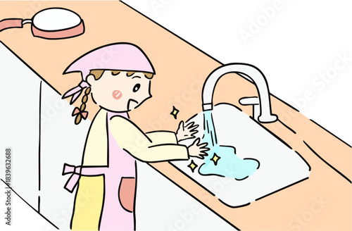 手洗いして料理の準備をする女の子
