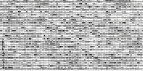 Seamless abstract geometric texture of vintage gray and brown stone mosaic tiles on an old wall surface