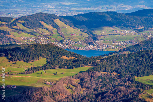 Landscape of Lake, Mountain and Swiss Village . Swiss Alps, Rigi Kulm, Lucerne, Switzerland.