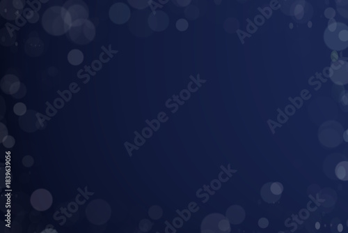blue abstract background with bokeh light effect in the dark
