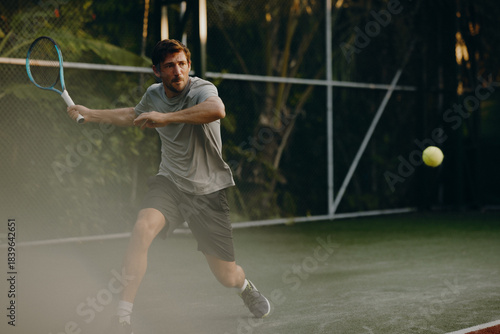 Tennis player executing a forehand shot