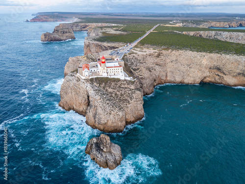 Cape Saint Vincent, Lighthouse, Cliffs and Atlantic Ocean in Evening. Aerial Drone Shot. Algarve, Portugal