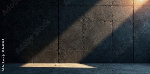 Dramatic sunlit black wall, textured concrete Close-up dark graphite detail , design, rough