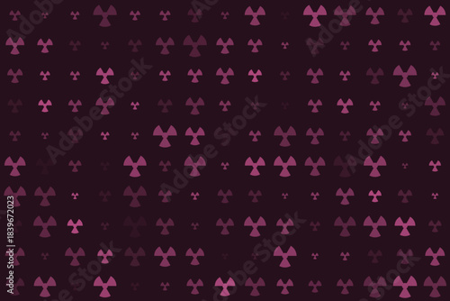 Abstract digital pattern of repeating pink radiation warning symbols on a dark background, representing nuclear energy and hazard