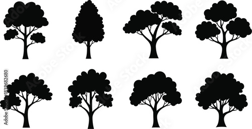 Collection of diverse black tree silhouettes on transparent background