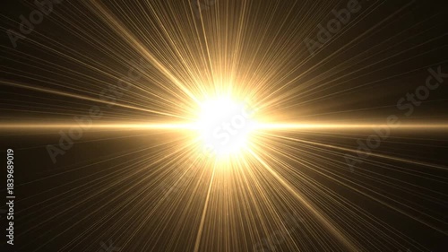 Bright Light Bursting with Rays on Black Background