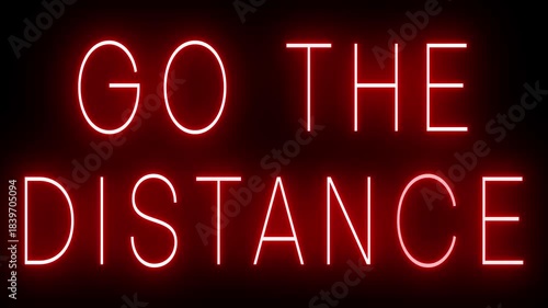 Retro red neon sign that flickers and glows with GO THE DISTANCE