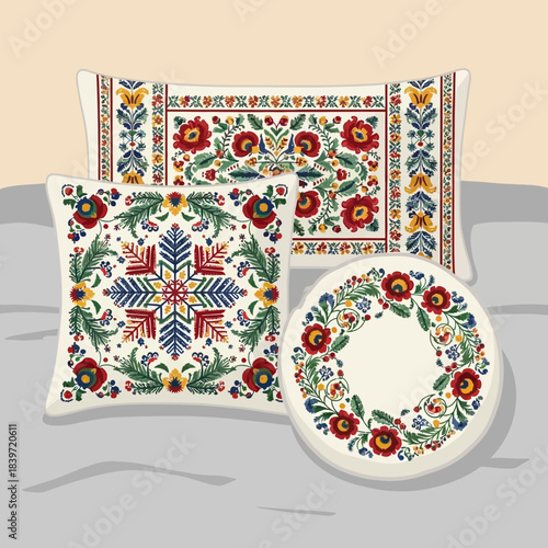 Set of four embroidered decorative pillows and a plate with traditional floral patterns showcasing