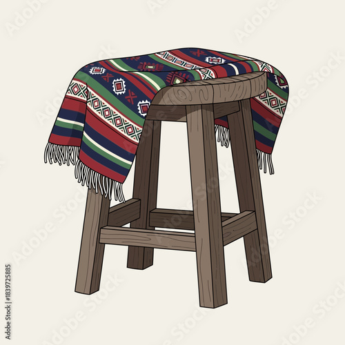 Colorful patterned textile draped over a rustic wooden stool with a traditional design