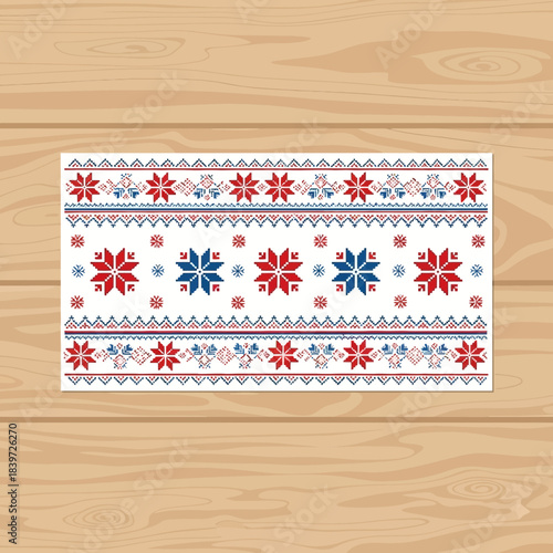 Festive holiday knit pattern with snowflakes and geometric elements on white background