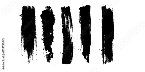 Grunge vector set of black ink and paint brush splashes, splatters, and strokes forming a dirty textured border design