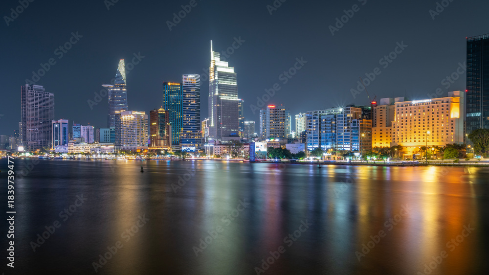 Fototapeta premium August 12, 2024: sunset in District 1, Ho Chi Minh City, Vietnam