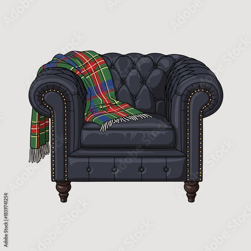 Elegant dark blue leather armchair with tufted design and a colorful tartan blanket draped over