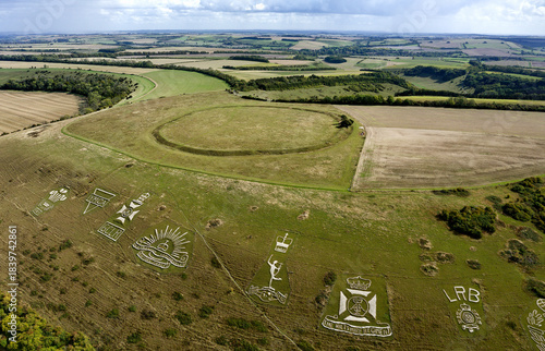Chiselbury Iron Age Hillfort, Wiltshire. The circular univallate fort is seen above the Fovant Badges. Regimental badges cut into chalk date from WW1