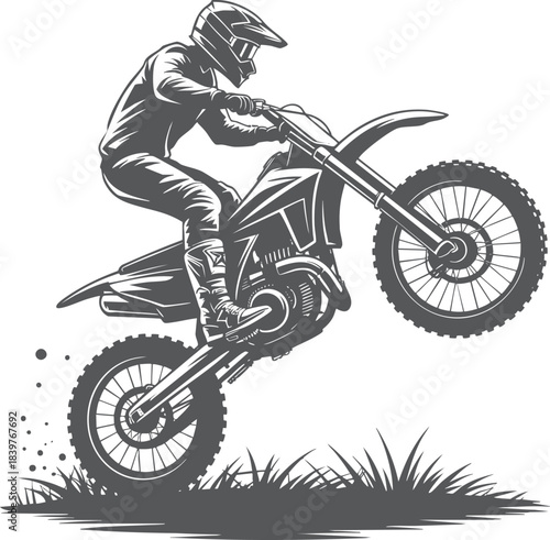 Dirt Bike Rider Performing Wheelie Over Rough Terrain