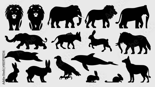 Black silhouettes of various animals and birds including lions, elephants, rabbits, and more