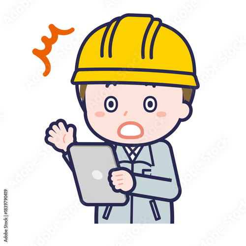 タブレットを使う「工事作業員」の男性