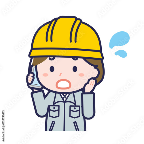 スマートフォンを使う「工事作業員」の女性