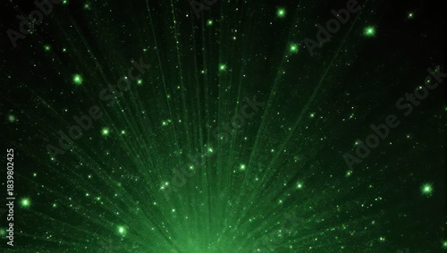 Radiant green energy burst with sparkling particles on a black background.