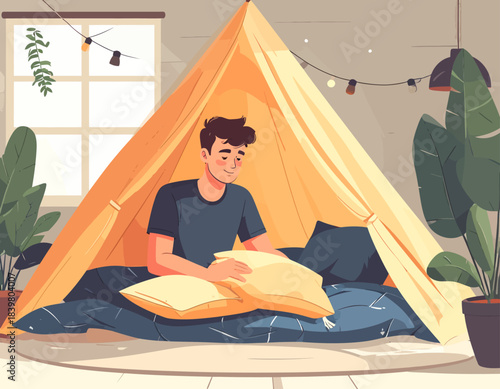 A man creates a cozy retreat inside an indoor tent, arranging pillows for comfort. A charming scene of stay-at-home fun and relaxation.